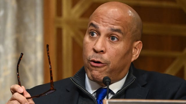 New Jersey Democratic Sen. Cory Booker's staffer was arrested for allegedly carrying gun on Capitol grounds.