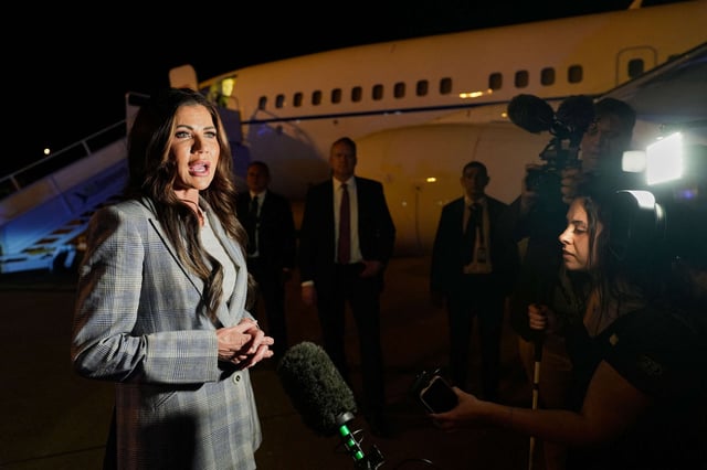 U.S. Secretary of Homeland Security Kristi Noem takes questions from the press before boarding her plane at El Salvador International Airport in San Salvador, El Salvador, on March 26, 2025.