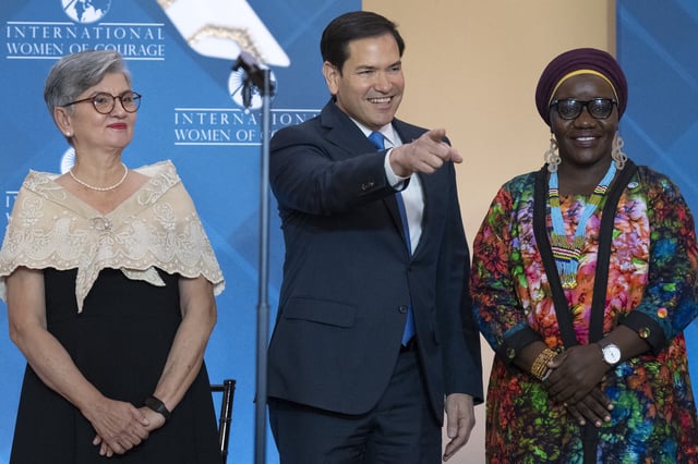 Secretary of State Marco Rubio, center, next to Angelique Songco, of the Philippines, left, who is also known as "Mama Ranger," at the Tubbataha Reefs Natural Park, and Zabib Musa Loro Bakhit, of South Sudan, a women's rights leader, attends the International Women of Courage award ceremony, Tuesday, April 1, 2025, at the State Department in Washington. (AP Photo/Jacquelyn Martin)