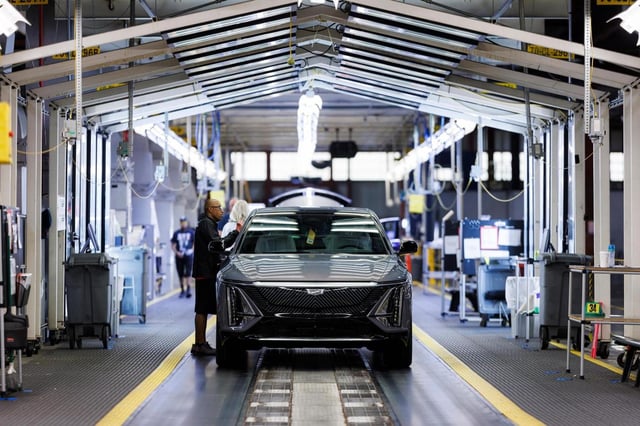 FILE — Vehicles are passed through final inspection at the end of the assembly line at the General Motors facility in Spring Hill, Tenn., Oct. 7, 2024. Sales of cars picked up recently partly as buyers rushed to lock in deals before President Trump’s 25 percent tariffs on cars and auto parts go into effect. (Brett Carlsen/The New York Times)