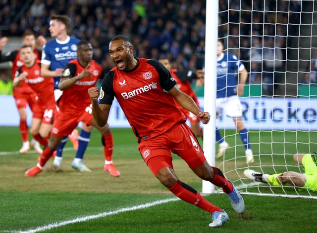 Soccer Football - DFB Cup - Semi Final - Arminia Bielefeld v Bayer Leverkusen - Bielefelder Alm, Bielefeld, Germany - April 1, 2025 Bayer Leverkusen's Jonathan Tah celebrates scoring their first goal REUTERS/Thilo Schmuelgen