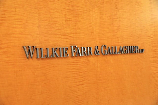 Signage is seen at the legal offices of the law firm Willkie Farr & Gallagher in New York City, New York, U.S., May 19, 2021. REUTERS/Andrew Kelly