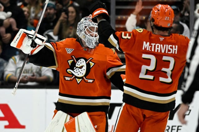 Ducks goaltender Lukas Dostal, left, celebrates with center Mason McTavish after their 4-3 shootout victory over the San Jose Sharks on Tuesday night at Honda Center. McTavish scored the only goal of the six-shot shootout. (AP Photo/Alex Gallardo)