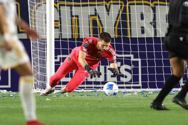 Galaxy goalkeeper John McCarthy dives for the ball during the second half of the first leg of their CONCACAF Champions Cup quarterfinal against Tigres on Tuesday night at Dignity Health Sports Park in Carson. The match ended in a scoreless tie. (Photo by Raul Romero Jr., Contributing Photographer)