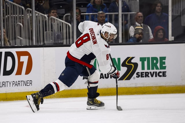 Apr 1, 2025; Boston, Massachusetts, USA; Washington Capitals left wing Alex Ovechkin (8) lets go with a shot against the Boston Bruins during the second period at TD Garden. Mandatory Credit: Winslow Townson-Imagn Images