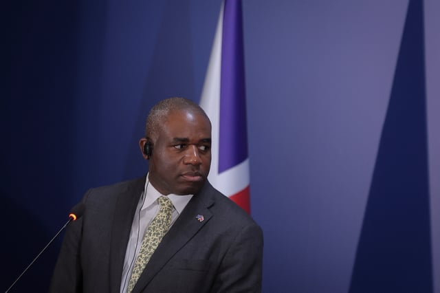 British Foreign Secretary David Lammy reacts during a press conference with President of the Republic of Kosovo Vjosa Osmani (not pictured) in Pristina, Kosovo April 2, 2025. REUTERS/Valdrin Xhemaj