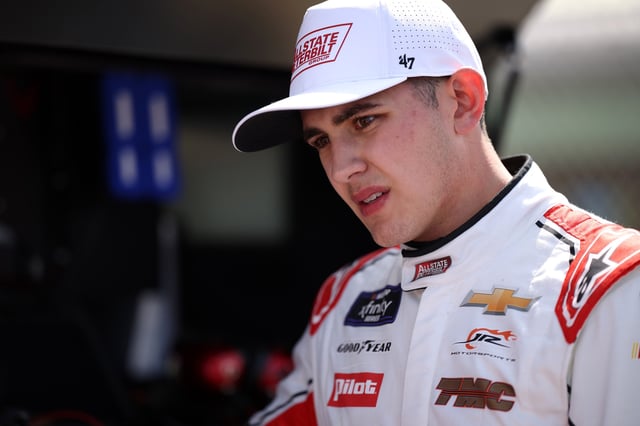 Sammy Smith, driver of the #8 Allstate Peterbilt Group Chevrolet, looks on during qualifying for the NASCAR Xfinity Series Hard Rock Bet 300 at Homestead-Miami Speedway on March 22, 2025 in Homestead, Florida.