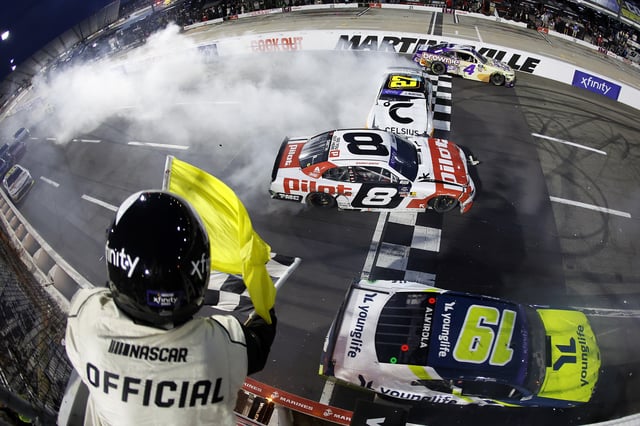 Sammy Smith, driver of the #8 Pilot Chevrolet, and Jeb Burton, driver of the #27 Celsius Chevrolet, spin after an on-track incident under caution to end the NASCAR Xfinity Series US Marine Corps 250 at Martinsville Speedway on March 29, 2025 in Martinsville, Virginia.