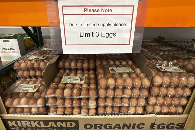 A limit sign hangs over a display of brown eggs in a Costco warehouse Thursday, March 13 in Sheridan, Colo.