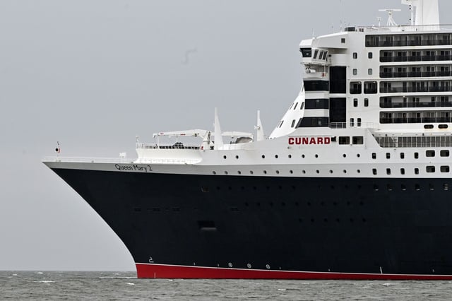 The Cunard line logo on the fleet flagship Queen Mary 2 as she lies off North Queensferry, near the Forth Bridge, on September 1, 2024 in North Queensferry, Scotland.