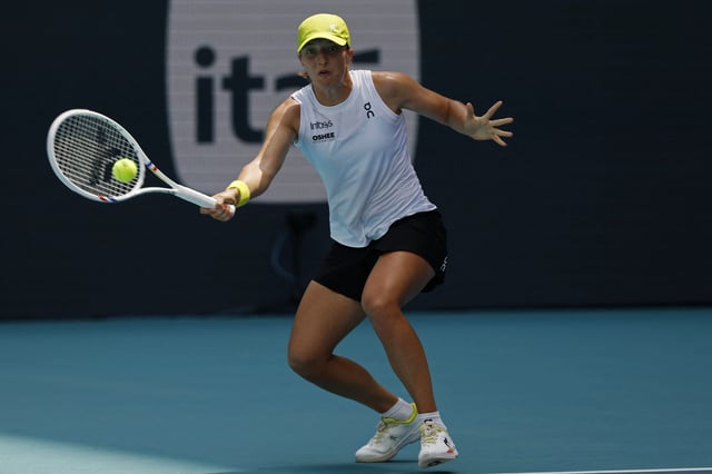 Mar 26, 2025; Miami, FL, USA; Iga Swiatek (POL) hits a forehand against Alexandra Eala (PHL)(not pictured) on day nine of the Miami Open at Hard Rock Stadium. Mandatory Credit: Geoff Burke-Imagn Images