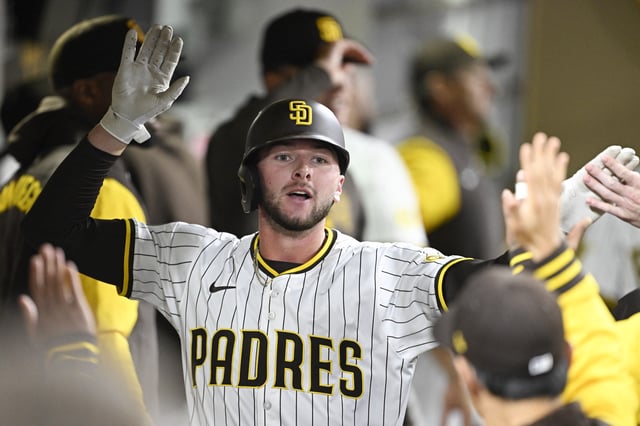 Apr 1, 2025; San Diego, California, USA; San Diego Padres center fielder Jackson Merrill (3) is congratulated after hitting a solo home run during the fourth inning against the Cleveland Guardians at Petco Park. Mandatory Credit: Denis Poroy-Imagn Images