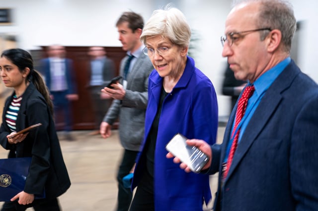 U.S. Senator Elizabeth Warren (D-MA) speaks to members of the media at the U.S. Capitol, in Washington, D.C., U.S., March 12, 2025. REUTERS/Nathan Howard