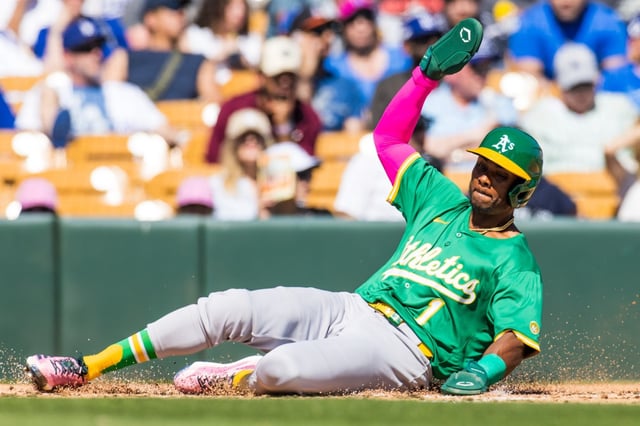 Esteury Ruiz, seen with the Athletics sliding into home plate during  a spring training game against the Dodgers on March 9, 2025, in Glendale, Arizona, has been acquired by the Dodgers. (Photo by John E. Moore III/Getty Images)