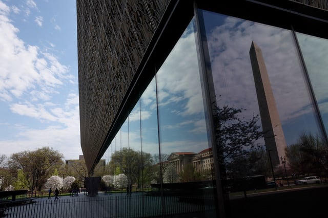 People enter and exit the Smithsonian’s National Museum of African American History and Culture in Washington, D.C., U.S., March 28, 2025. REUTERS/Leah Millis     TPX IMAGES OF THE DAY/File Photo