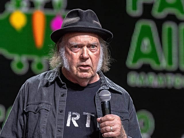 SARATOGA SPRINGS, NEW YORK - SEPTEMBER 21: Neil Young on stage during Farm Aid 2024 at Saratoga Performing Arts Center on September 21, 2024 in Saratoga Springs, New York. (Photo by Gary Miller/Getty Images)