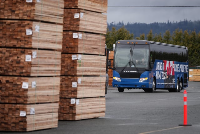 Conservative Leader Pierre Poilievre arrives on his bus for a campaign stop at Western Forest Products Duke Point Sawmill, in Nanaimo, B.C., on March 28, 2025.