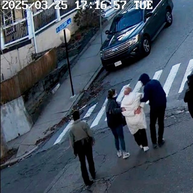 In this image taken from security camera video, Rumeysa Ozturk, a 30-year-old doctoral student at Tufts University, is detained by Department of Homeland Security agents on a street in Sommerville, Mass., Tuesday, March 26, 2025. (AP Photo)
