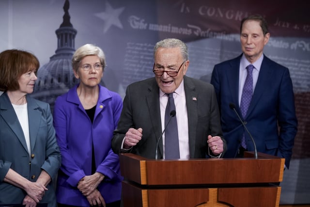 Senate Minority Leader Chuck Schumer, D-N.Y., speaking, is joined by, from left, Sen. Tina Smith, D-Minn., Sen. Elizabeth Warren, D-Mass., and Sen. Ron Wyden, D-Ore., as they criticize efforts by President Donald Trump, Elon Musk, and Republicans in Congress to compromise Social Security, during a news conference, at the Capitol, in Washington, Tuesday, April 1, 2025. (AP Photo/J. Scott Applewhite)