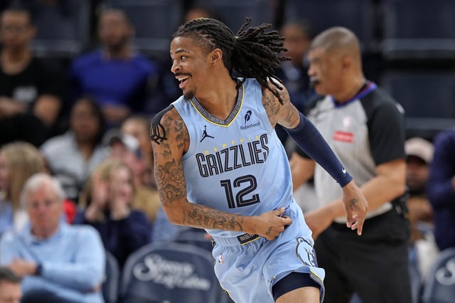 Ja Morant #12 of the Memphis Grizzlies reacts during the first half against the Boston Celtics at FedExForum on March 31, 2025 in Memphis, Tennessee.