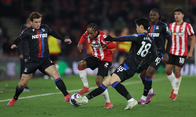 Soccer Football - Premier League - Southampton v Crystal Palace - St Mary's Stadium, Southampton, Britain - April 2, 2025 Southampton's Kyle Walker-Peters in action with Crystal Palace's Ben Chilwell and Daichi Kamada