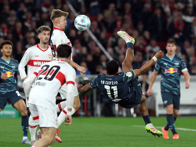 Soccer Football - DFB Cup - Semi Final - VFB Stuttgart v RB Leipzig - MHPArena, Stuttgart, Germany - April 2, 2025 VfB Stuttgart's Finn Jeltsch is hit in the face by a shot from RB Leipzig's Lois Openda REUTERS/Kai Pfaffenbach