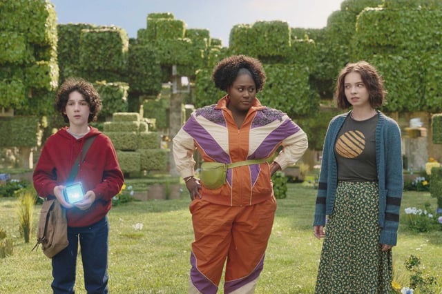 Sebastian Hansen, left, Danielle Brooks and Emma Myers in a scene from “A Minecraft Movie.” 