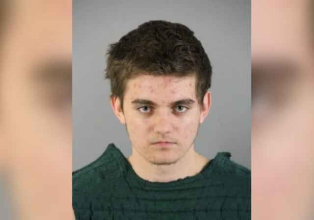 A mugshot of Nikita Casap, who has been charged with murdering his mother and stepfather.