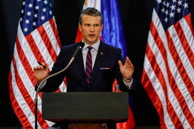 U.S. Defense Secretary Pete Hegseth holds a joint press conference with and Philippine Secretary of Defense Gilberto Teodoro at the Armed Forces of the Philippines Headquarters in Camp Aguinaldo in Quezon City, Philippines, Friday, March 28, 2025. (AP Photo/Gerard Carreon)
