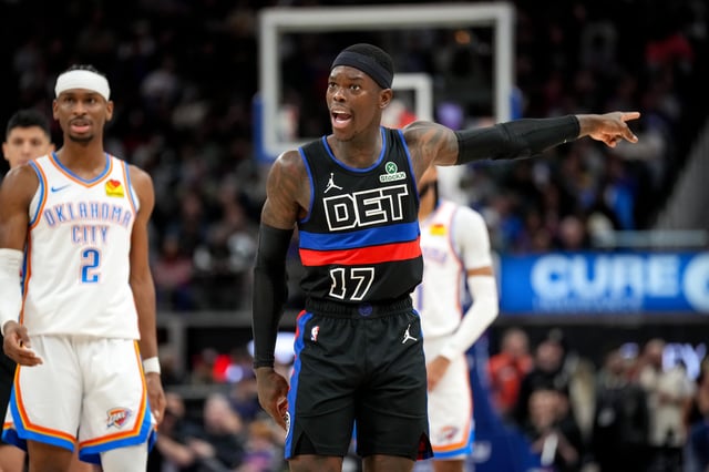 Dennis Schröder #17 of the Detroit Pistons reacts and points against the Oklahoma City Thunder at Little Caesars Arena on March 15, 2025 in Detroit, Michigan.