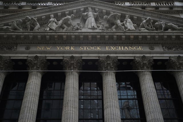 The exterior of the New York Stock Exchange is seen shortly after the close of the market, Wednesday, April 2, 2025. (AP Photo/Patrick Sison)