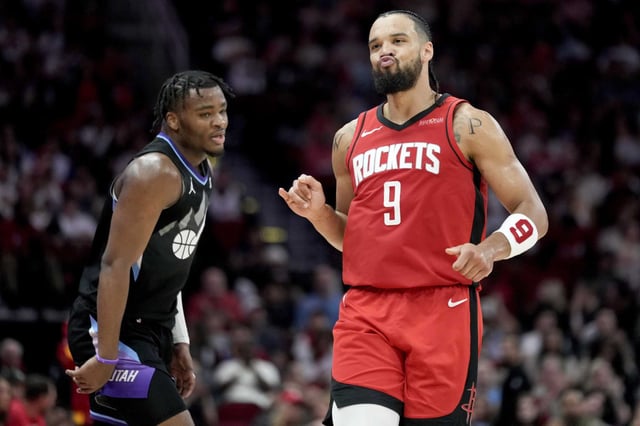 Houston Rockets forward Dillon Brooks (9) reacts after making a three point basket against the Utah Jazz during the first half of an NBA basketball game Wednesday, April, 2, 2025, in Houston. 