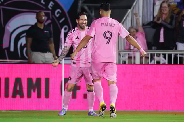 Lionel Messi #10 celebrates with Luis Suárez #9 of Inter Miami CF after scoring a goal against the Philadelphia Union during the second half at Chase Stadium on March 29, 2025 in Fort Lauderdale, Florida.