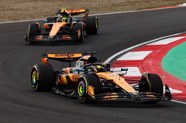 Formula One F1 - Chinese Grand Prix - Shanghai International Circuit, Shanghai, China - March 23, 2025 McLaren's Oscar Piastri and McLaren's Lando Norris in action during the race REUTERS/Tyrone Siu