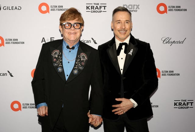 Elton John and David Furnish attend the Elton John AIDS Foundation Academy Awards Viewing Party, to celebrate the 97th Oscars Academy Awards in West Hollywood, California, U.S., March 2, 2025. REUTERS/Jeenah Moon/File Photo