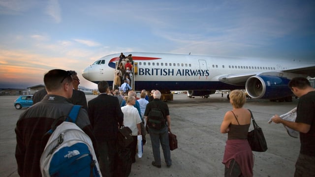 The Climate Change Committee chief said that Britons should be able to afford one holiday abroad a year