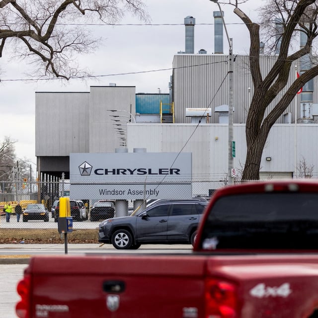 Vehicles drive by the Stellantis's Chrysler Windsor Assembly facility in Windsor, Ont., February 4, 2025.