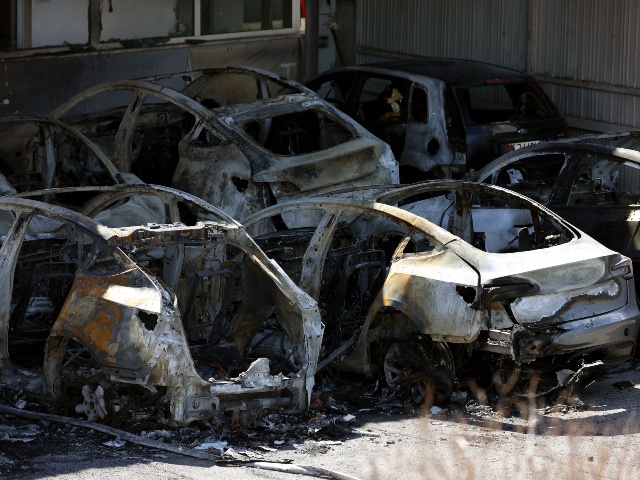 Damaged Tesla Inc. electric vehicles after a fire at a company's dealership in Rome, Italy, on Monday, March 31, 2025. Italian police are probing the cause of a fire at a Tesla Inc. electric-vehicle dealership in Rome that left 17 cars damaged. Photographer: Alessia Pierdomenico/Bloomberg