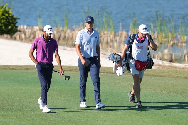 Akshay Bhatia of the United States and Ludvig Åberg of Sweden walks the 12th fairway during the second round of the Hero World Challenge 2024 at Albany Golf Course on December 06, 2024 in Nassau, Bahamas.