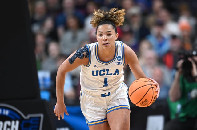 Mar 30, 2025; Spokane, WA, USA; UCLA Bruins guard Kiki Rice (1) brings the ball up court against the LSU Lady Tigers during the first half of a Elite 8 NCAA Tournament basketball game at Spokane Arena. Mandatory Credit: James Snook-Imagn Images/File Photo