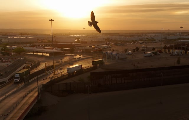 A drone view shows trucks crossing into the United States via the Zaragoza-Ysleta border bridge, in Ciudad Juarez, Mexico, April 2, 2025. REUTERS/Jose Luis Gonzalez/File Photo