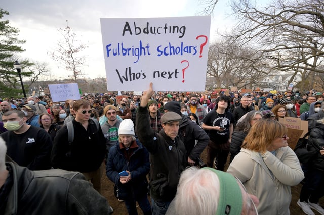 Demonstrators take part in the Stand with Rumeysa Ozturk,Tufts PHD Student emergency rally,  at Powder House Square Park, after Ozturk was taken into custody by federal agents, in Somerville, Massachusetts, U.S. March 26, 2025.  REUTERS/Faith Ninivaggi/File Photo