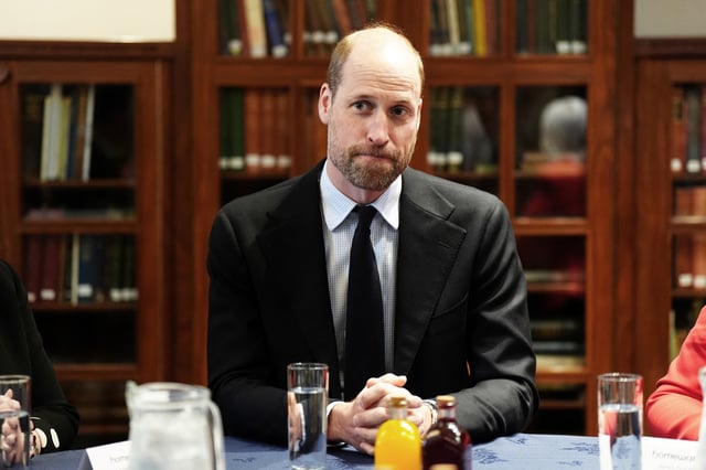 Britain's Prince William, Prince of Wales visits Aberdeen to mark the official launch of Invisible Cities, which has been supported by the Homewards Fund to introduce its walking tours to the city, in Aberdeen, Britain, March 27, 2025. Jane Barlow/Pool via REUTERS
