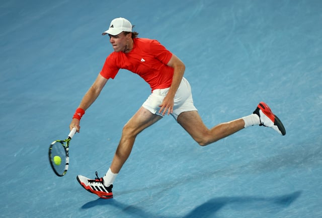 Tennis - Australian Open - Melbourne Park, Melbourne, Australia - January 20, 2025 Alex Michelsen of the U.S. in action during his fourth round match against Australia's Alex de Minaur REUTERS/Edgar Su/File Photo