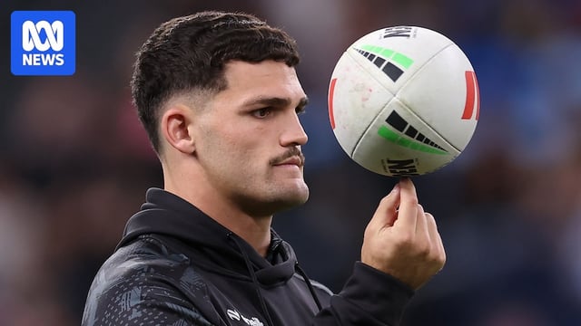 Penrith Panthers player Nathan Cleary spins a football on his finger.