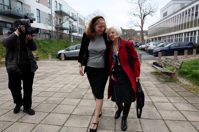 British anti-abortion activist Livia Tossici-Bolt, charged with alleged breaching of a 'buffer zone' outside Bournemouth clinic, is accompanied by Isabel Vaughan-Spruce of March For Life UK, as she arrives at Poole Magistrates' Court in Poole, Britain, April 4, 2025. REUTERS/Isabel Infantes