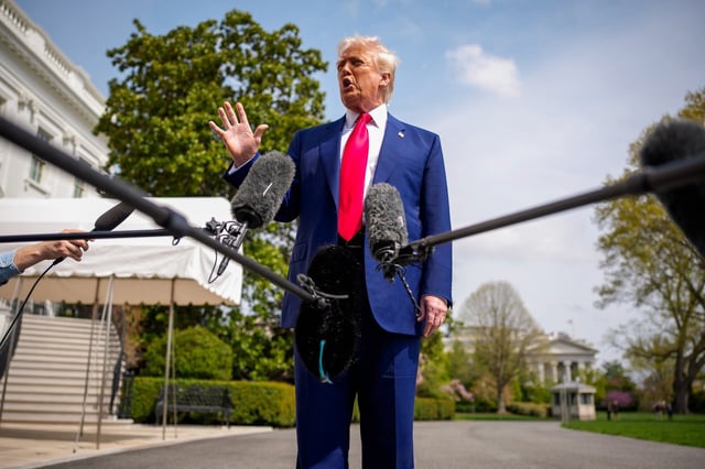 U.S. President Donald Trump speaks to members of the media before boarding Marine One on the South Lawn of the White House on April 3, 2025 in Washington, DC.