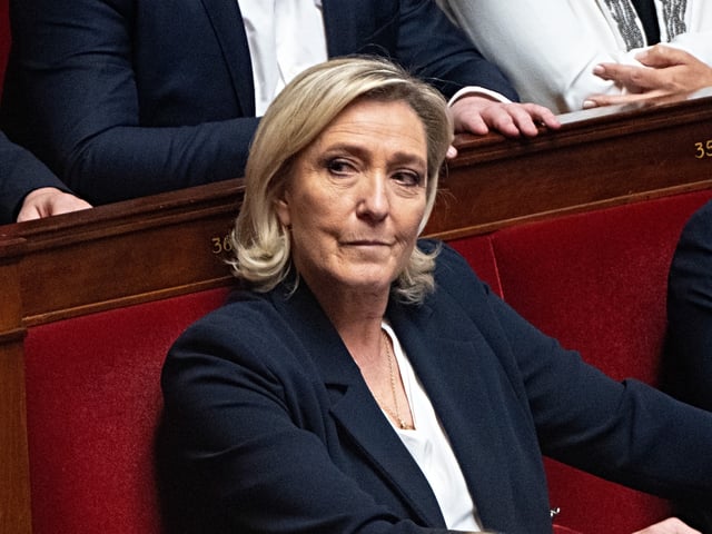 Marine Le Pen, leader of National Rally, at the National Assembly in Paris, France, on Tuesday, Dec. 17, 2024. Francois Bayrou, France’s prime minister, is holding talks with party leaders this week in an effort to form a government that can push a budget through a divided Parliament. Photographer: Nathan Laine/Bloomberg