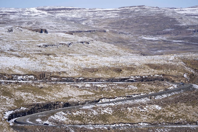 FILE - A car makes its way towards the Afriski ski resort near Butha-Buthe, Lesotho, Sunday July 31, 2022. (AP Photo/Jerome Delay, file)