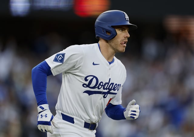 Freddie Freeman #5 of the Los Angeles Dodgers reacts to his solo home run while rounding the bases in the first inning against the Detroit Tigers at Dodger Stadium on March 29, 2025 in Los Angeles.